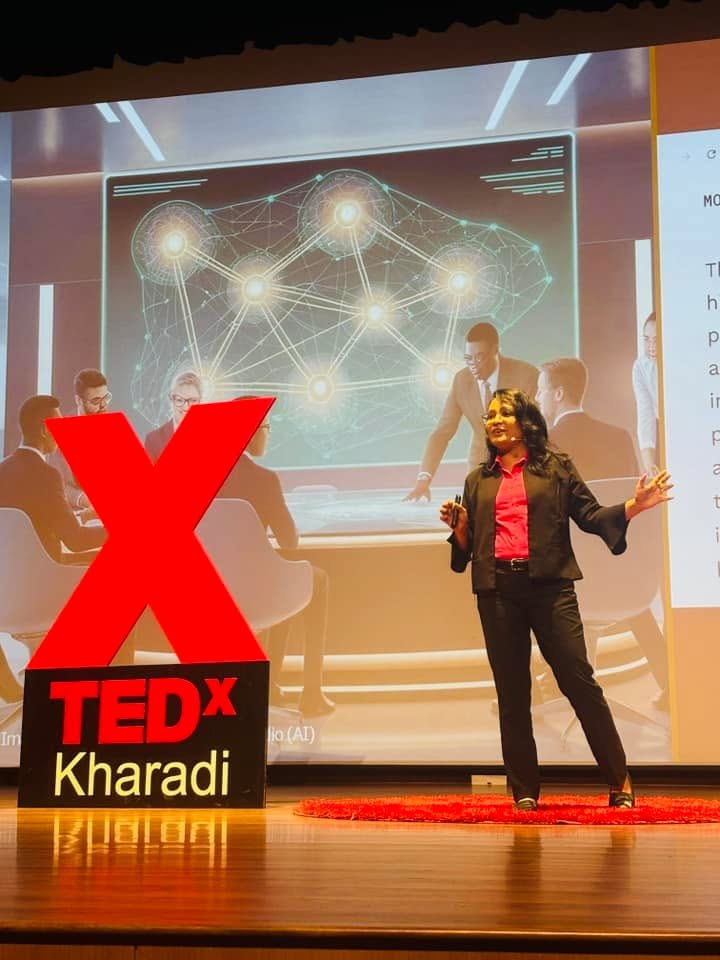 Poonam Jain receiving recognition at TEDx Kharadi